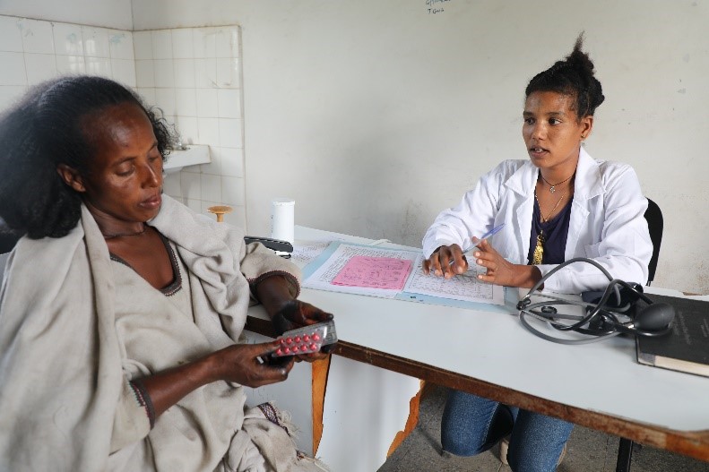 expectant mother in antenatal care consultation with a provider at the Hawelti Health Center